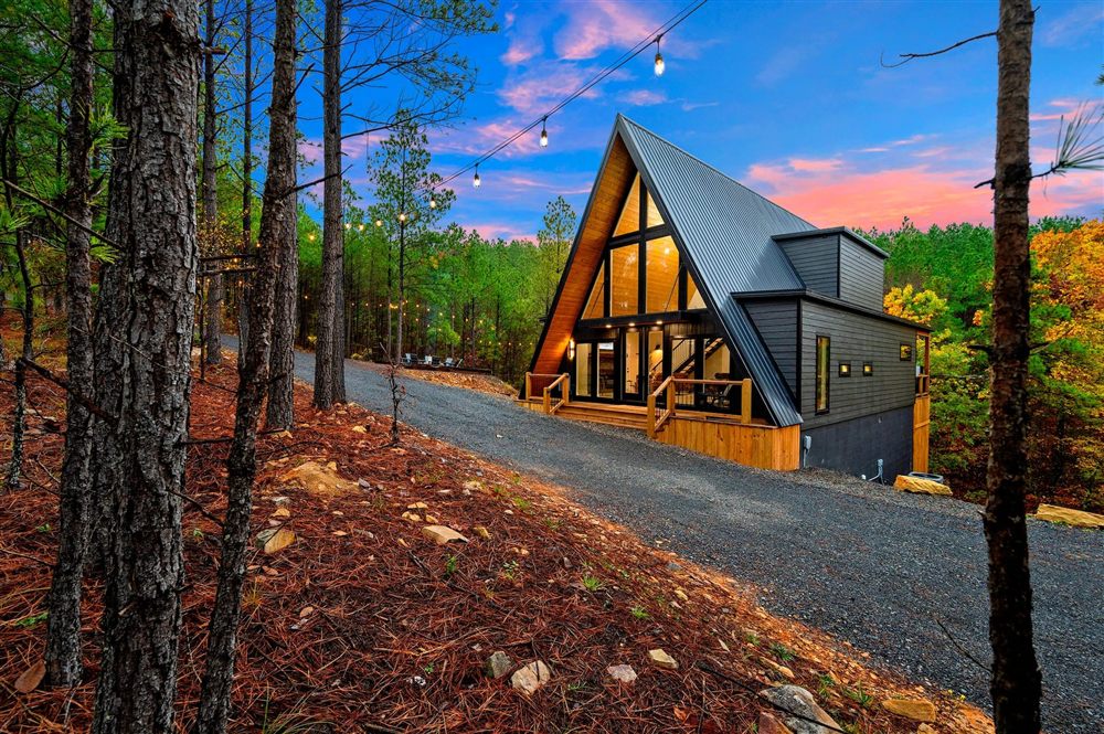 Adventus A-frame cabin exterior at dusk