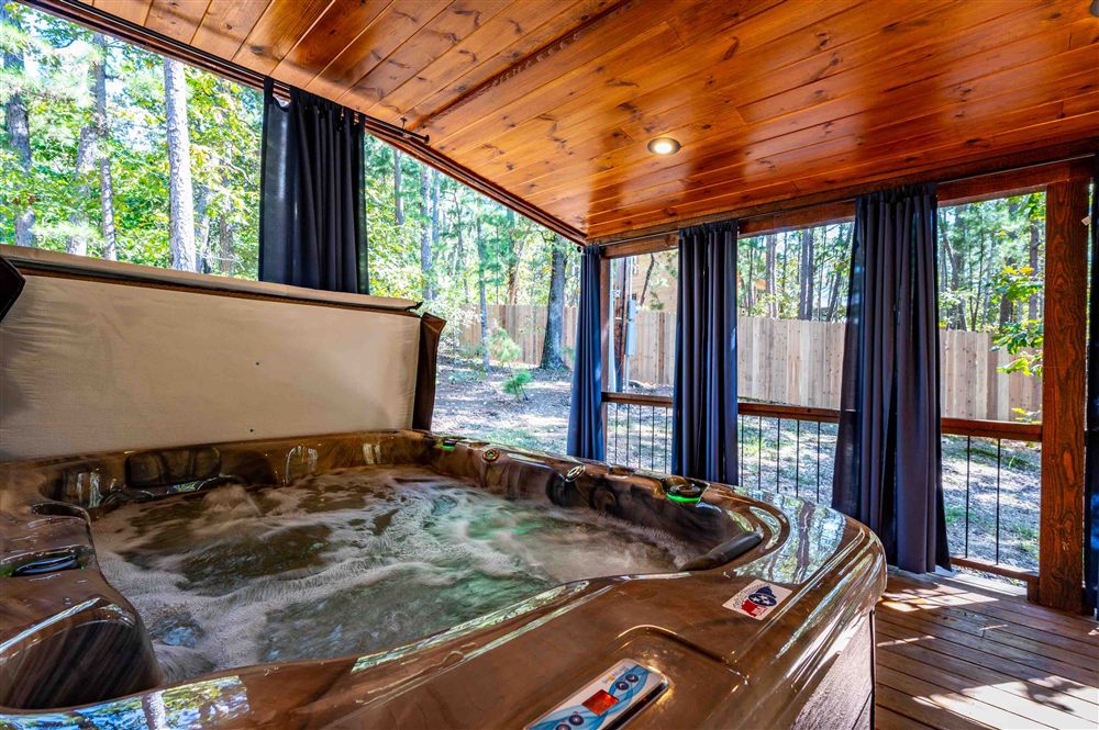 Blue Night Sky private hot tub on the screened porch