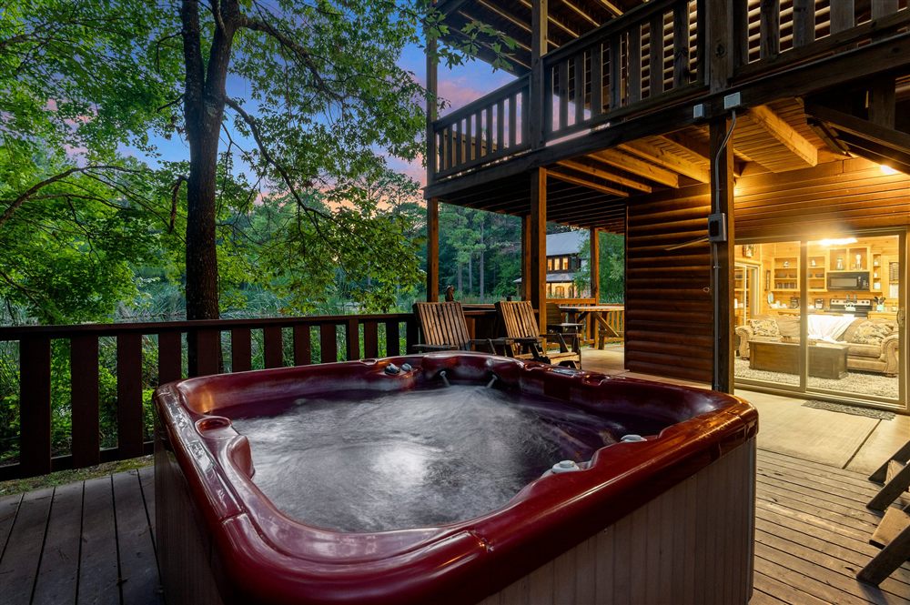 Lost Lake Treehouse private hot tub at dusk